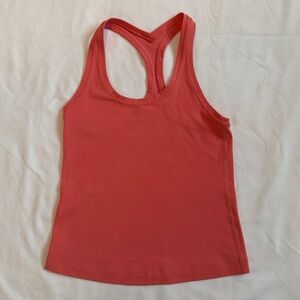 Lululemon Swiftly Tech Racerback Tank Top waist length. Size 2. Color is coral